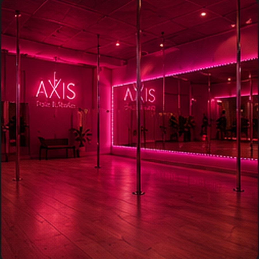Interior del estudio AXIS iluminado en rosa